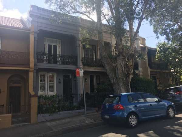 Townhomes with black iron balconies